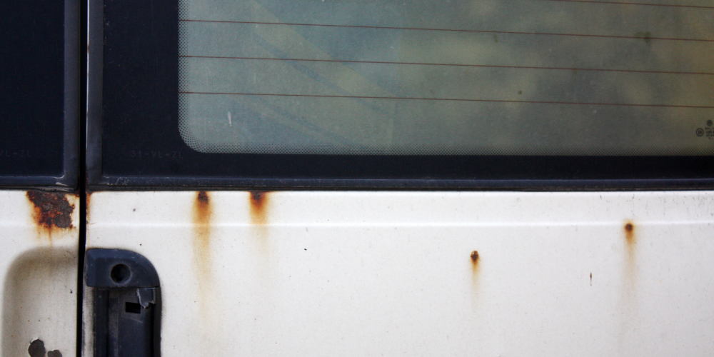 rust stains on white car paint
